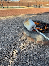The fire pit is perfect for roasting marshmallows! They do have wood for purchase on site, we usually bring our own just in case. They also have roasting sticks or whatever they are called. 😂