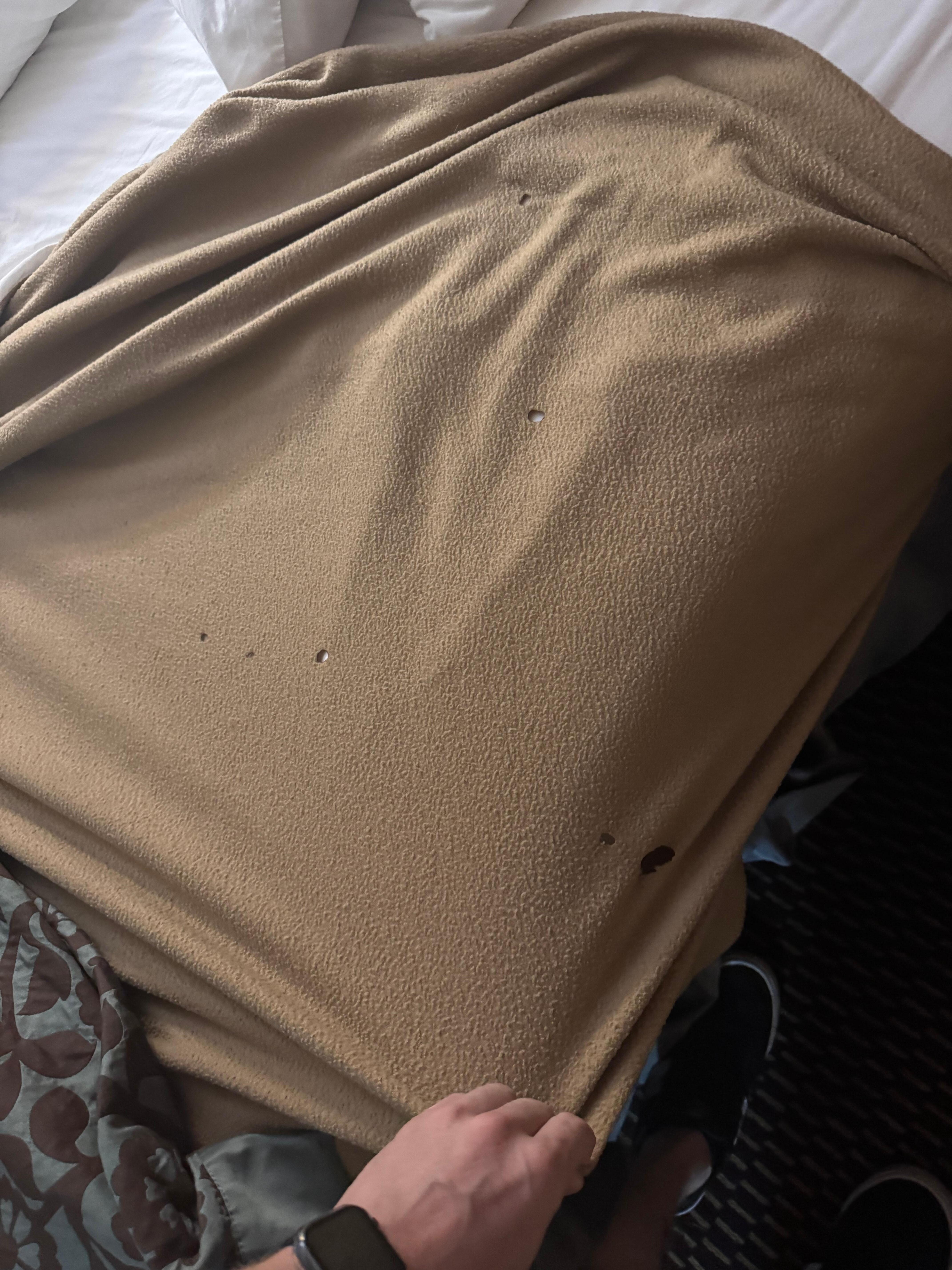 All blankets and bed itself burnt all over. 