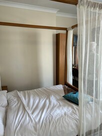The bed was nicely made. I forgot to take pictures before check-in. I did them on checkout.