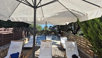 Sunbeds by the pool