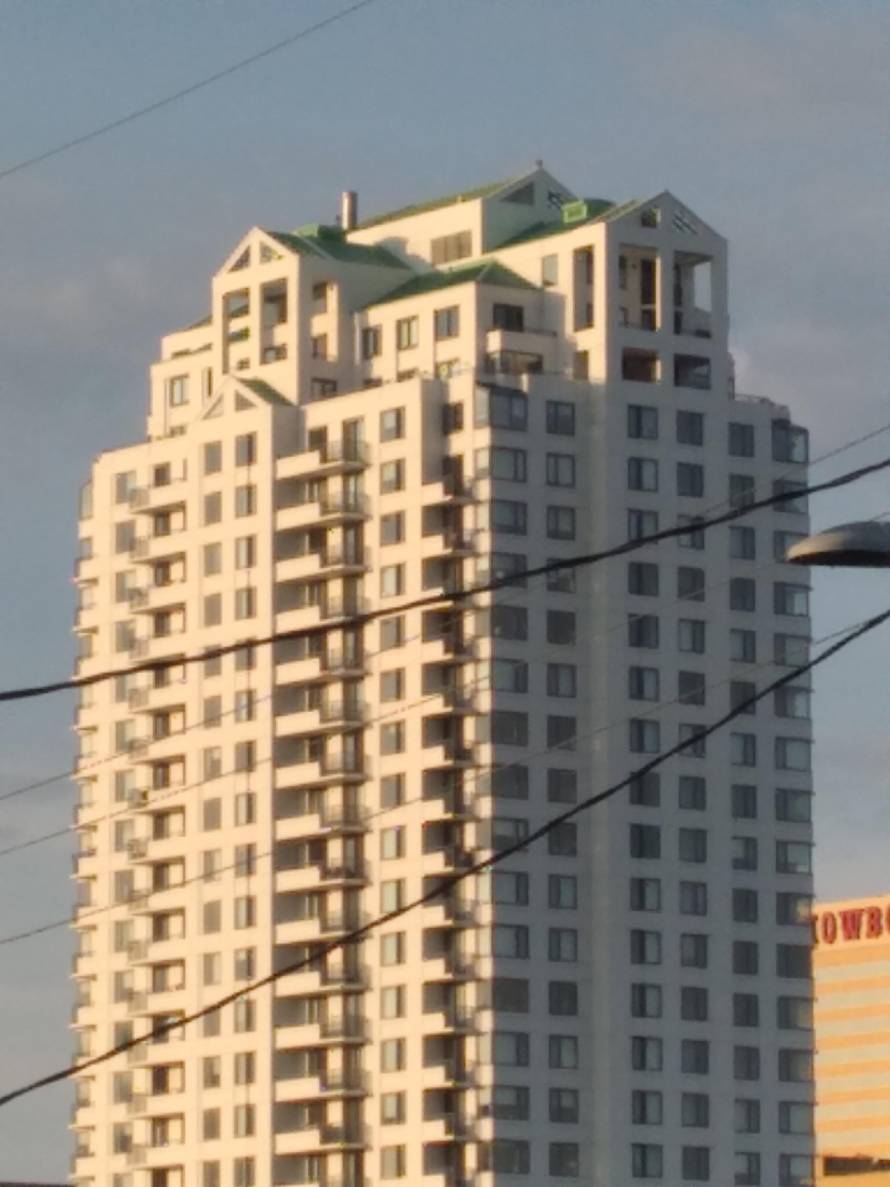 A view from front balcolny, mansion on top of building. Ample parking . Camera safe and seen from balcony and living room window.