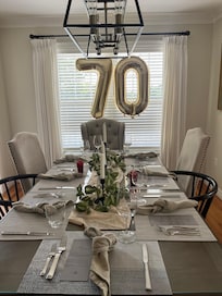The table setting in the beautiful dining room