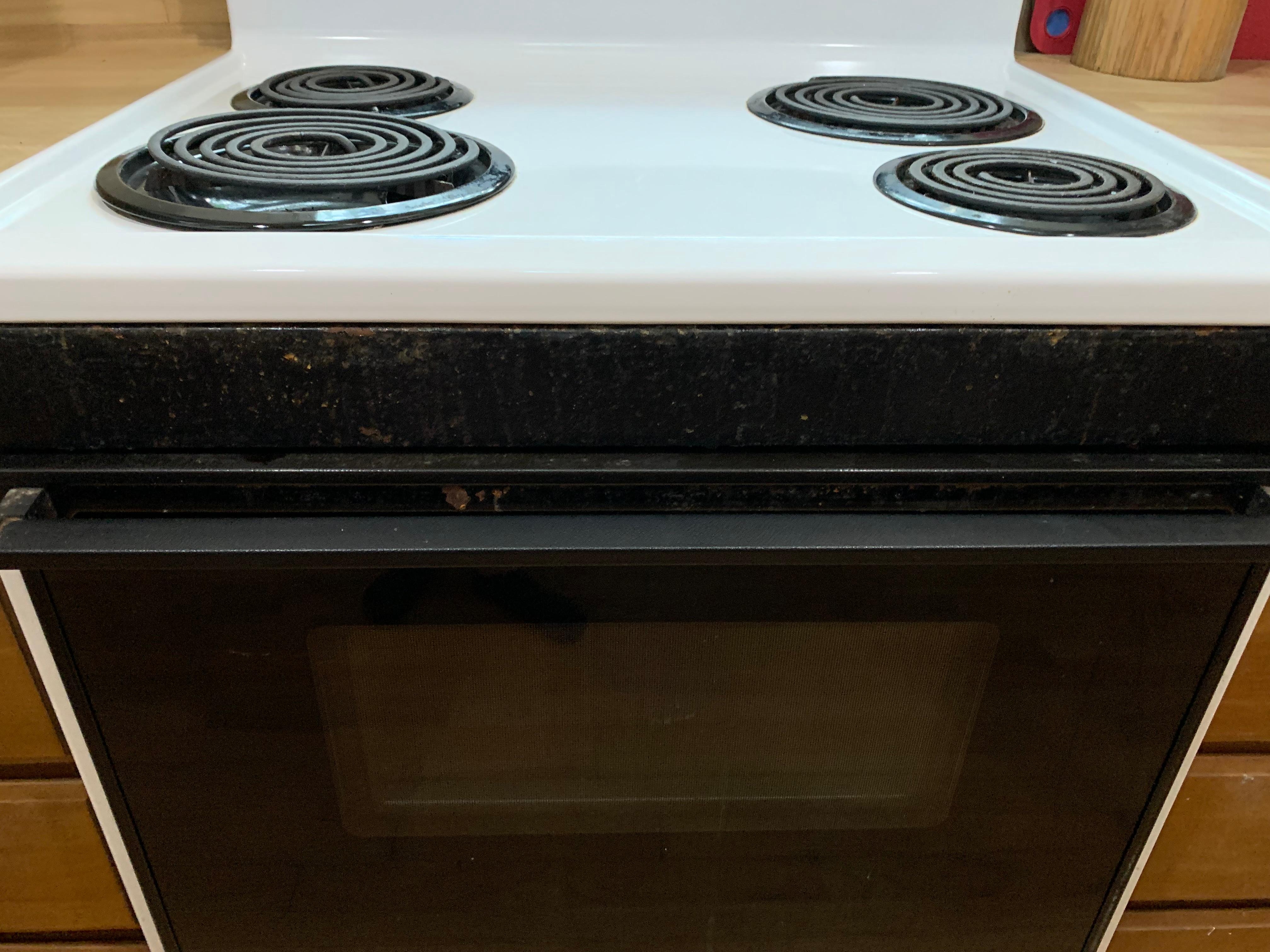 Months of grease buildup on the stove. 