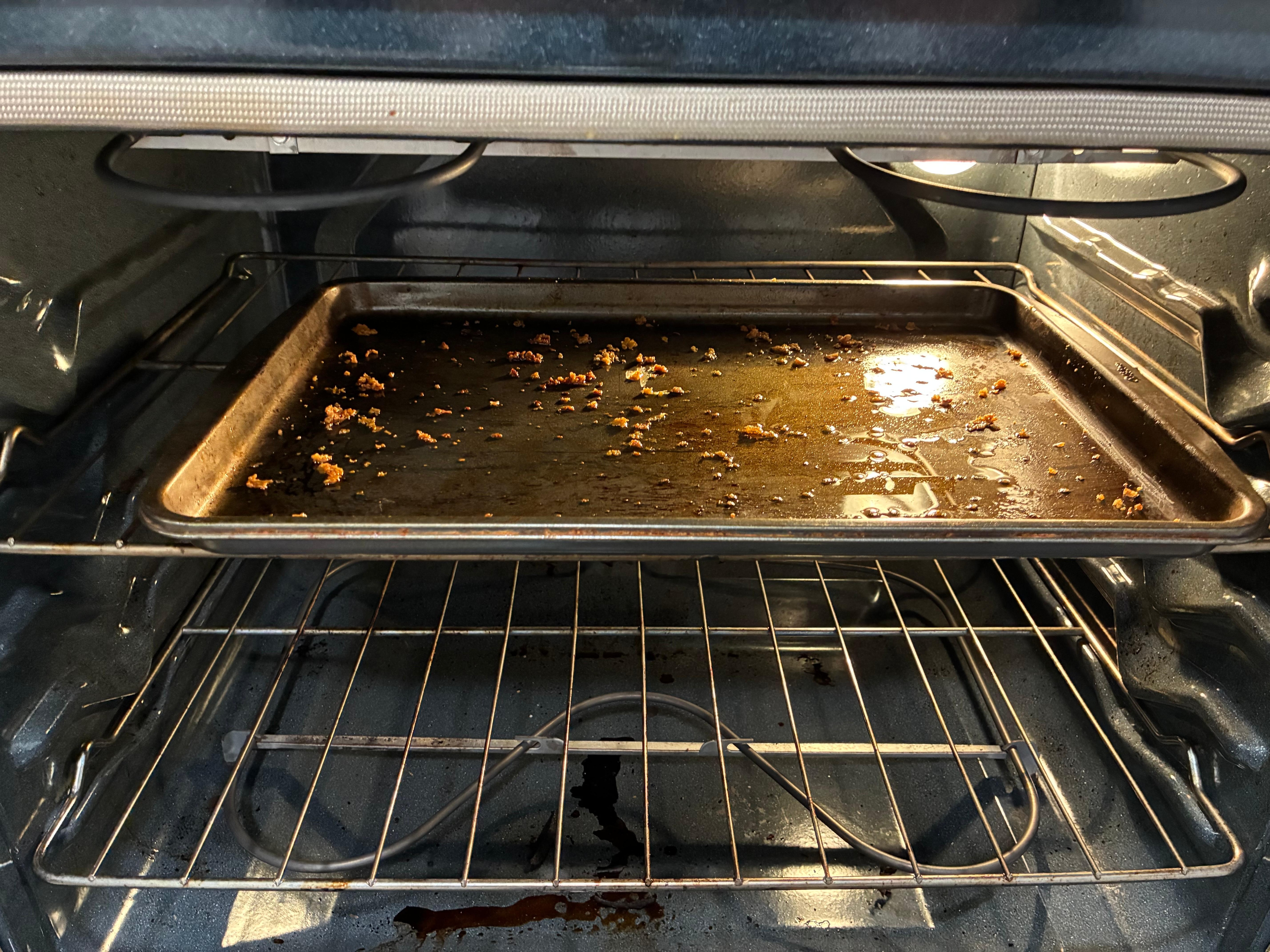 Greasy pan in oven