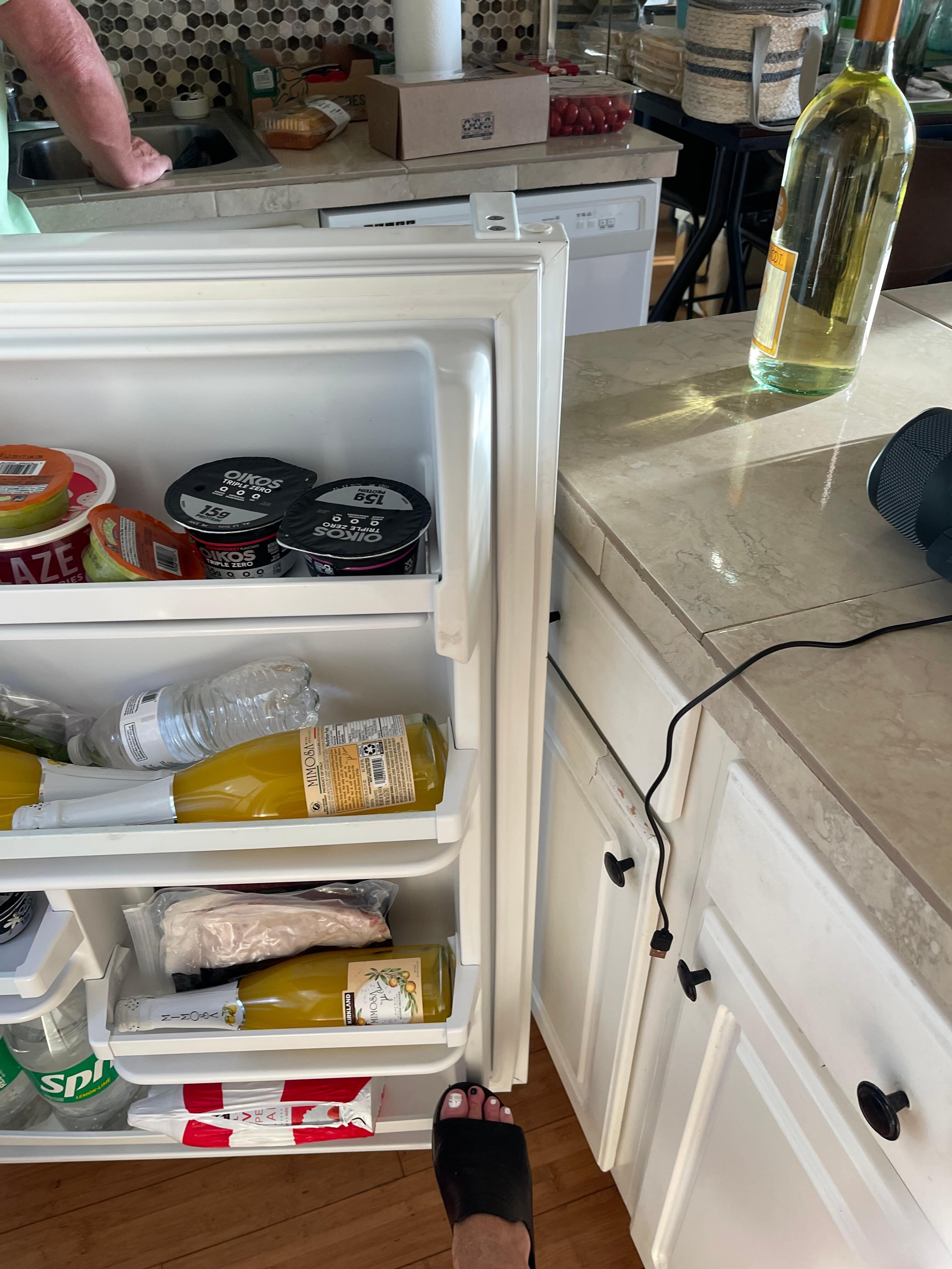 Refrigerator door that would not open all the way it would hit the kitchen island.