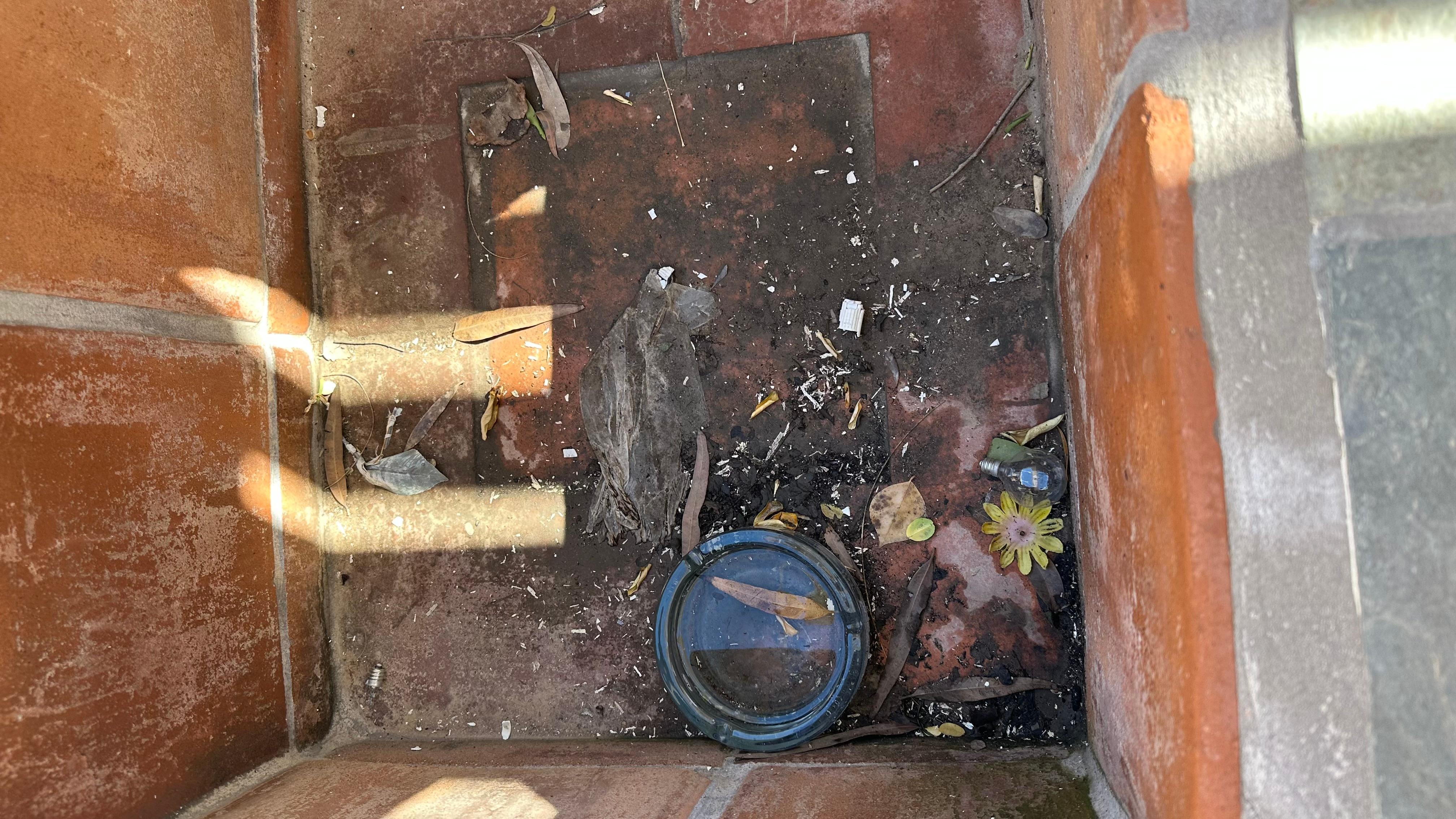 Garbage in the outdoor BBQ area