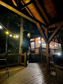 Looking back at the house/ screened in porch from the treehouse