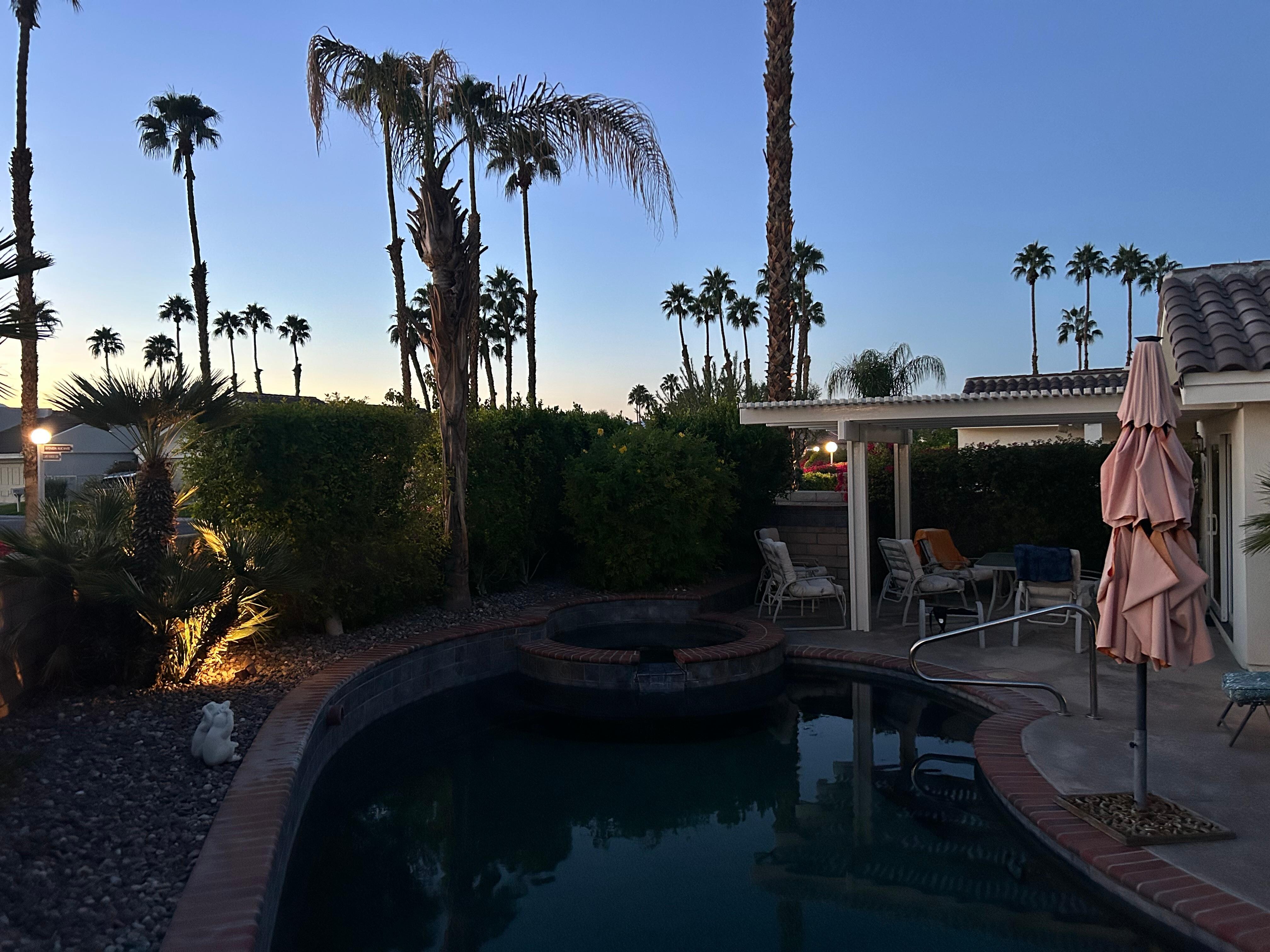 Watching sunset from poolside 