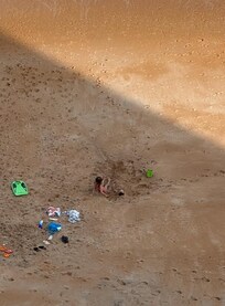 Getting buried by sister.