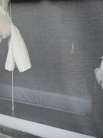 Front side of house sealed off bedroom window was up from the inside. We used hands that night to pull down for safety purposes.