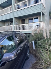 View from parking lot up towards condo.