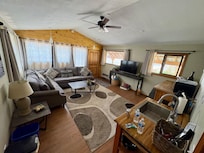 Living/kitchen. No stove but everything else.