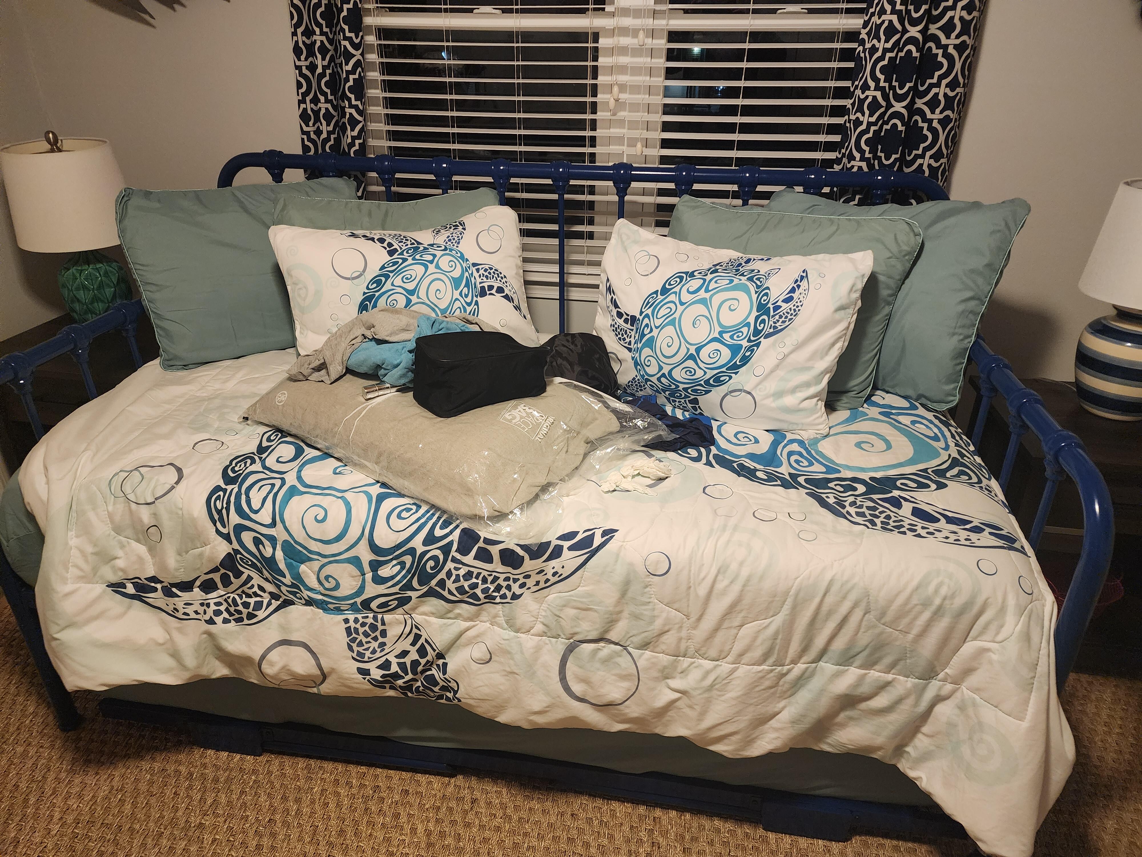 The kiddie trundle bed.