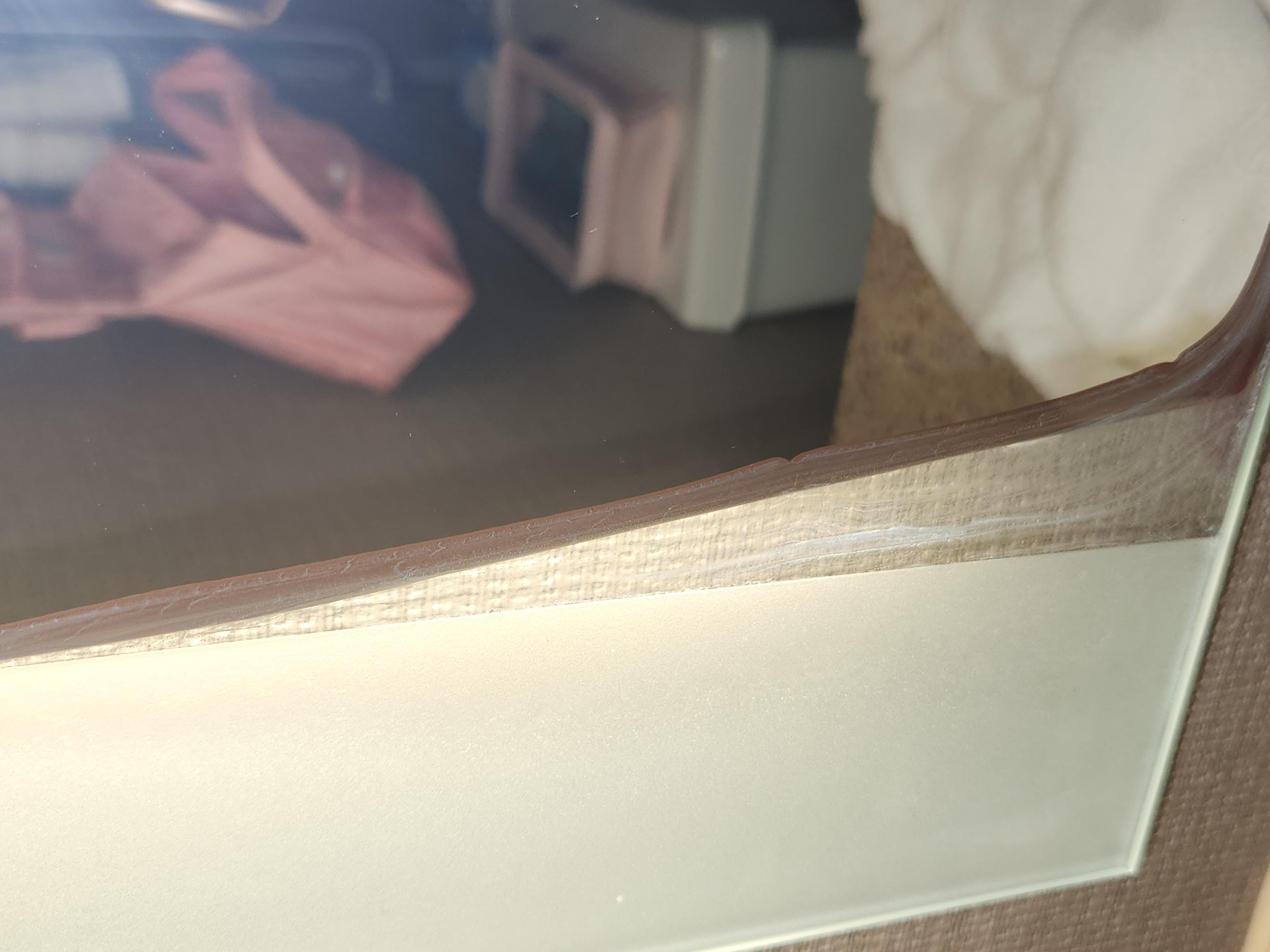 Bathroom mirror peeling