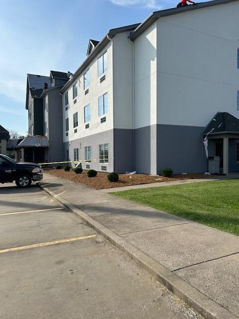 Front closed and nails laying everywhere on parking area and sidewalks