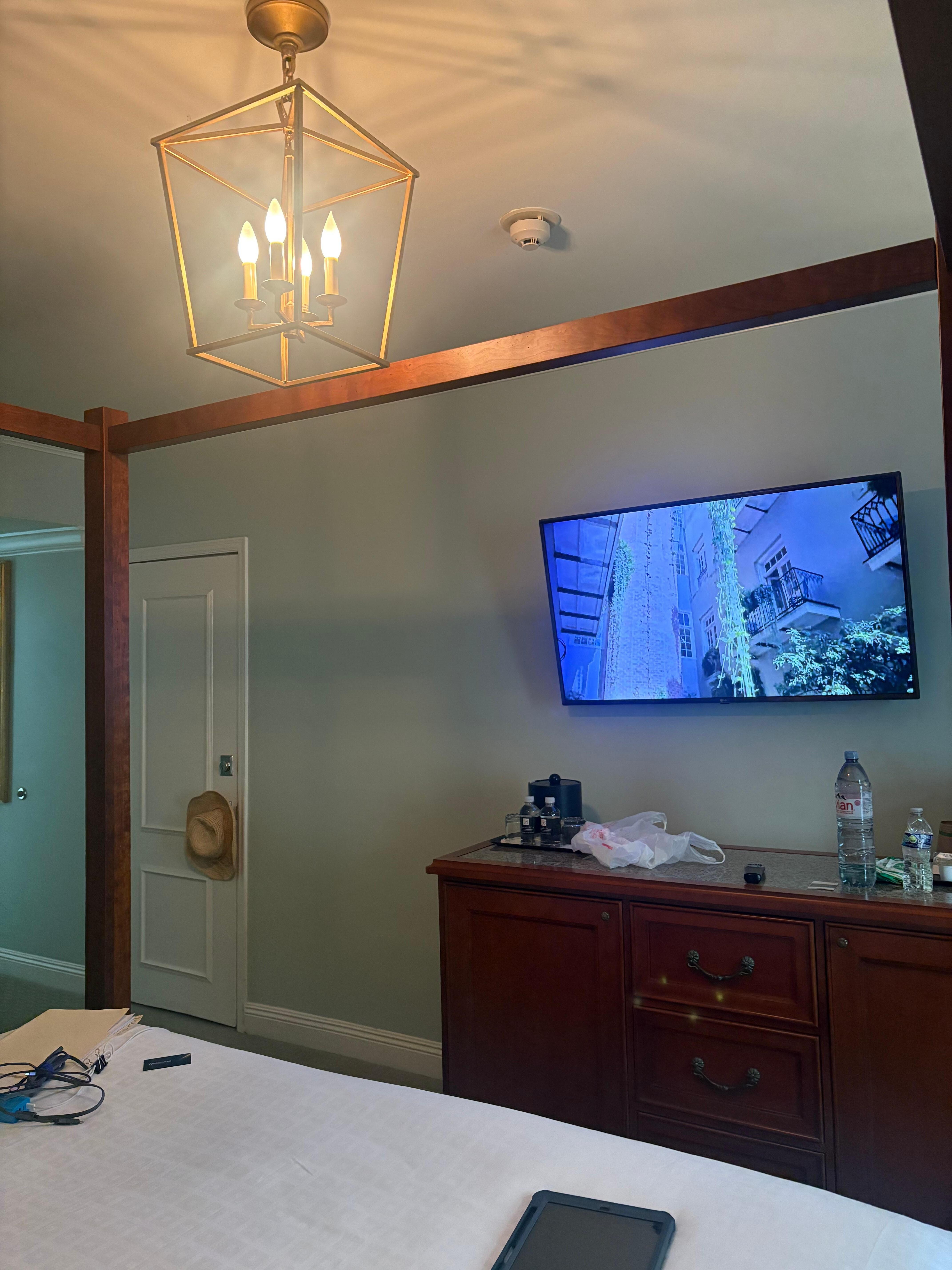 Flat screen and large dresser with small refrigerator. Plus nice desk etc. 
