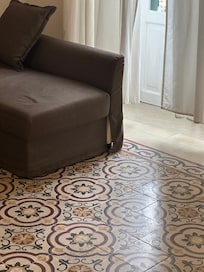 Sofa damaged and stained.