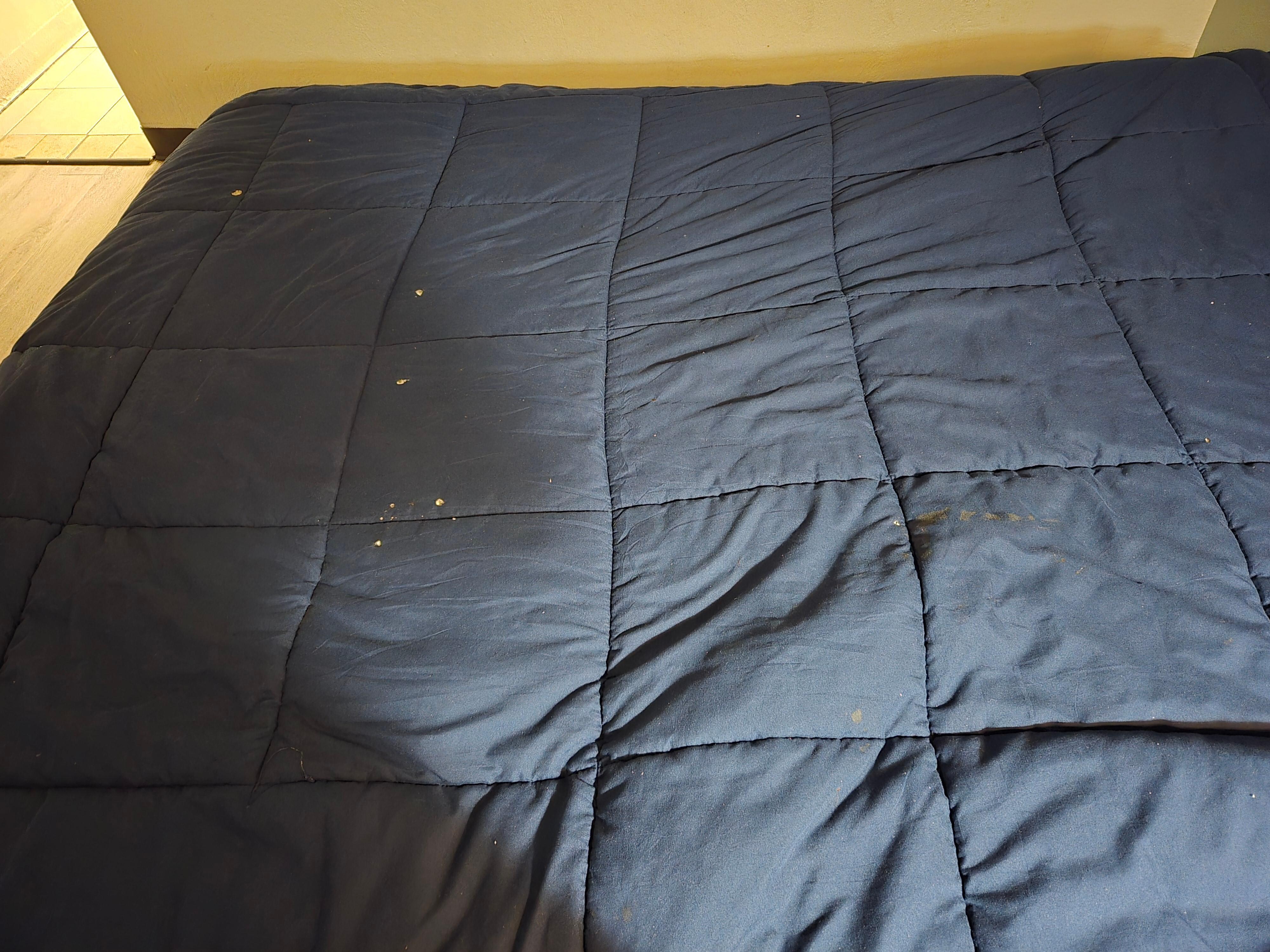 Cigarette burns in comforters. I didn't smoke in room, just got it because it was available and cheap.