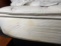 No mattress cover and stains on mattress.