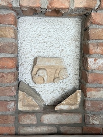 Ancient artifacts procured in-site during construction on display throughout the property