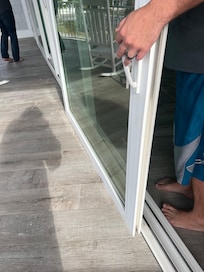 The glass sliding door that came down! We picked them up before picture because it fell on someone!