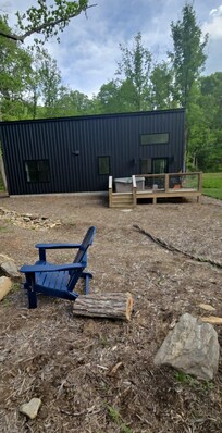 Back yard by creek and fire pot