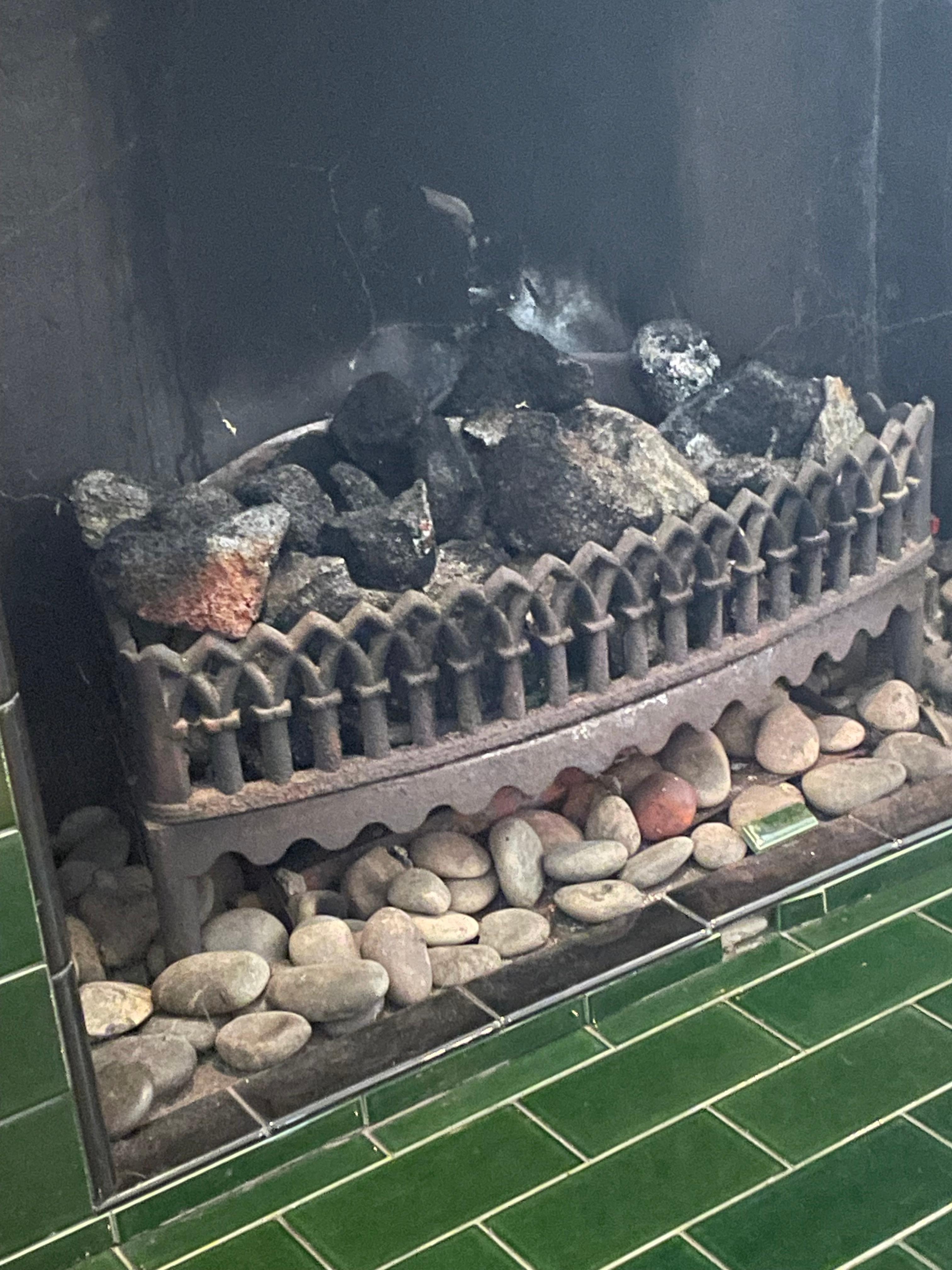 Burnt logs in fireplace not removed before our check in. Did not smell good.