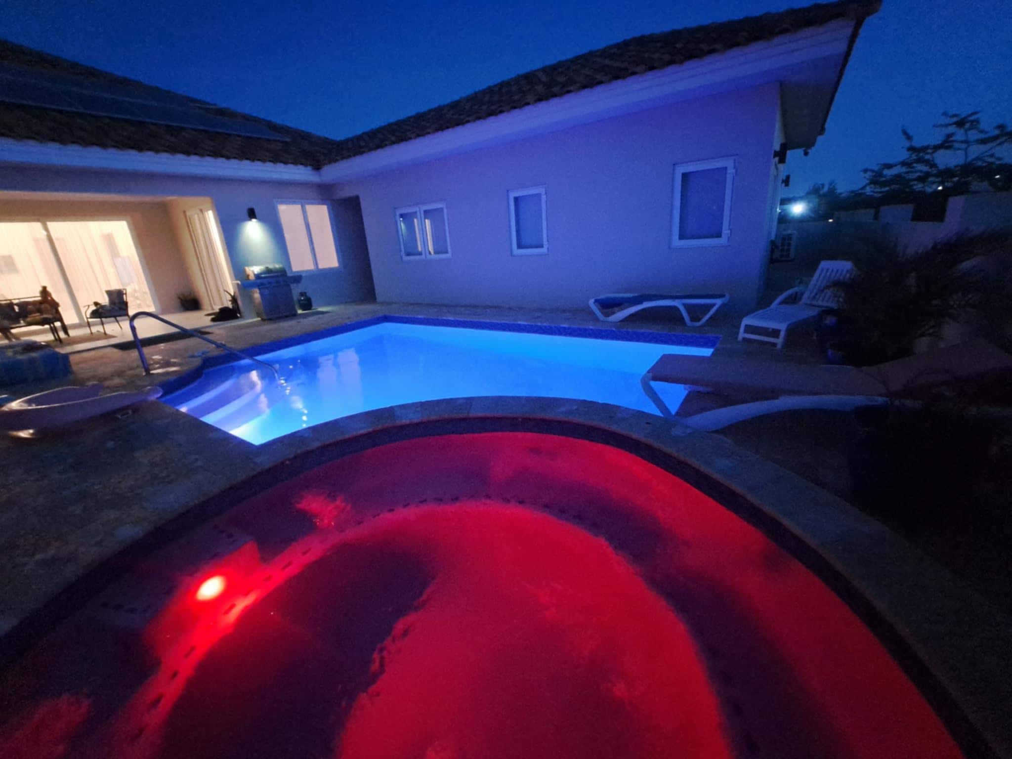 Pool and jacuzzi at night