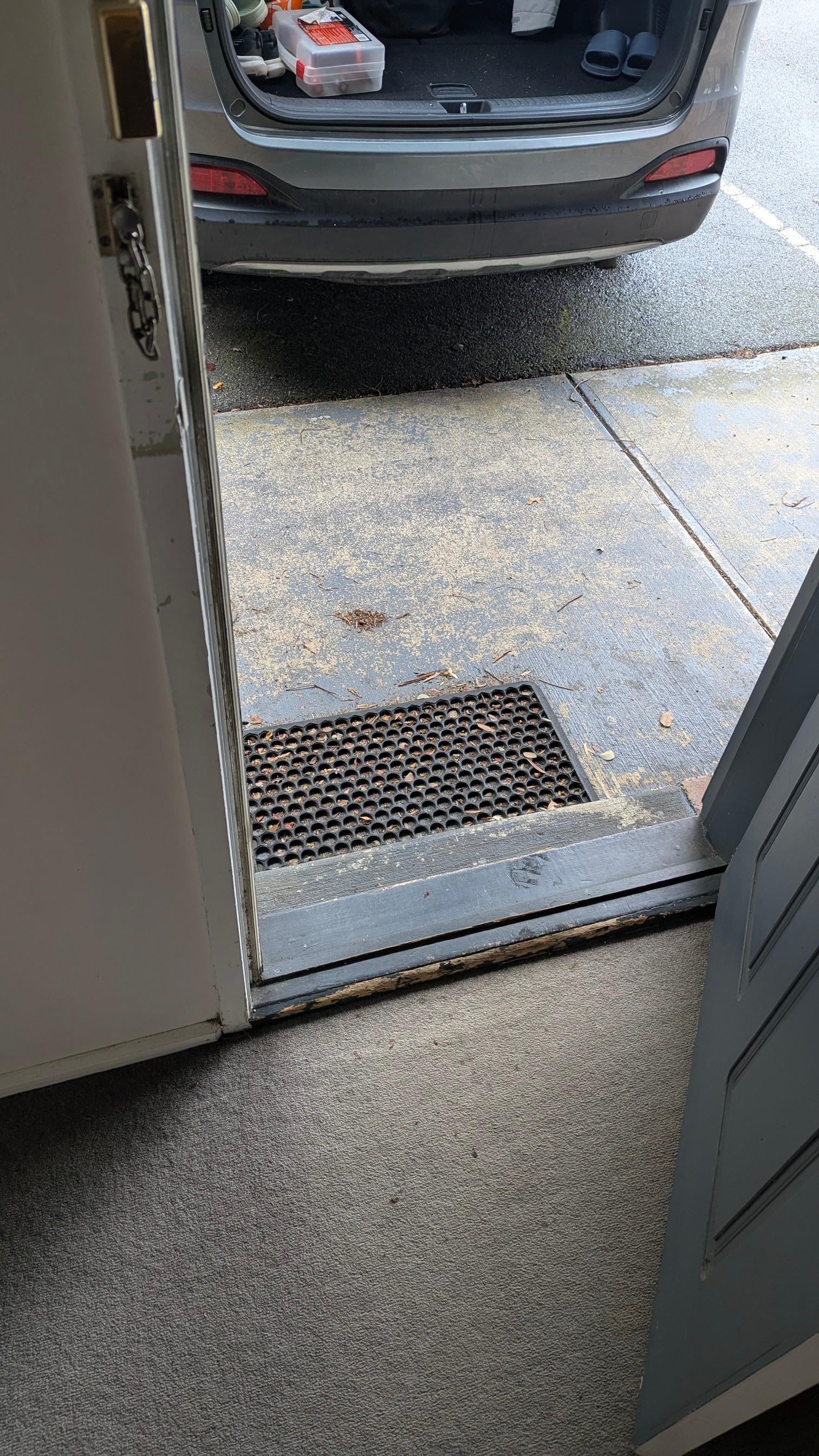 Dirty carpet at entrance 