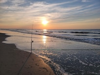 Beautiful sunrise and good surf fishing.