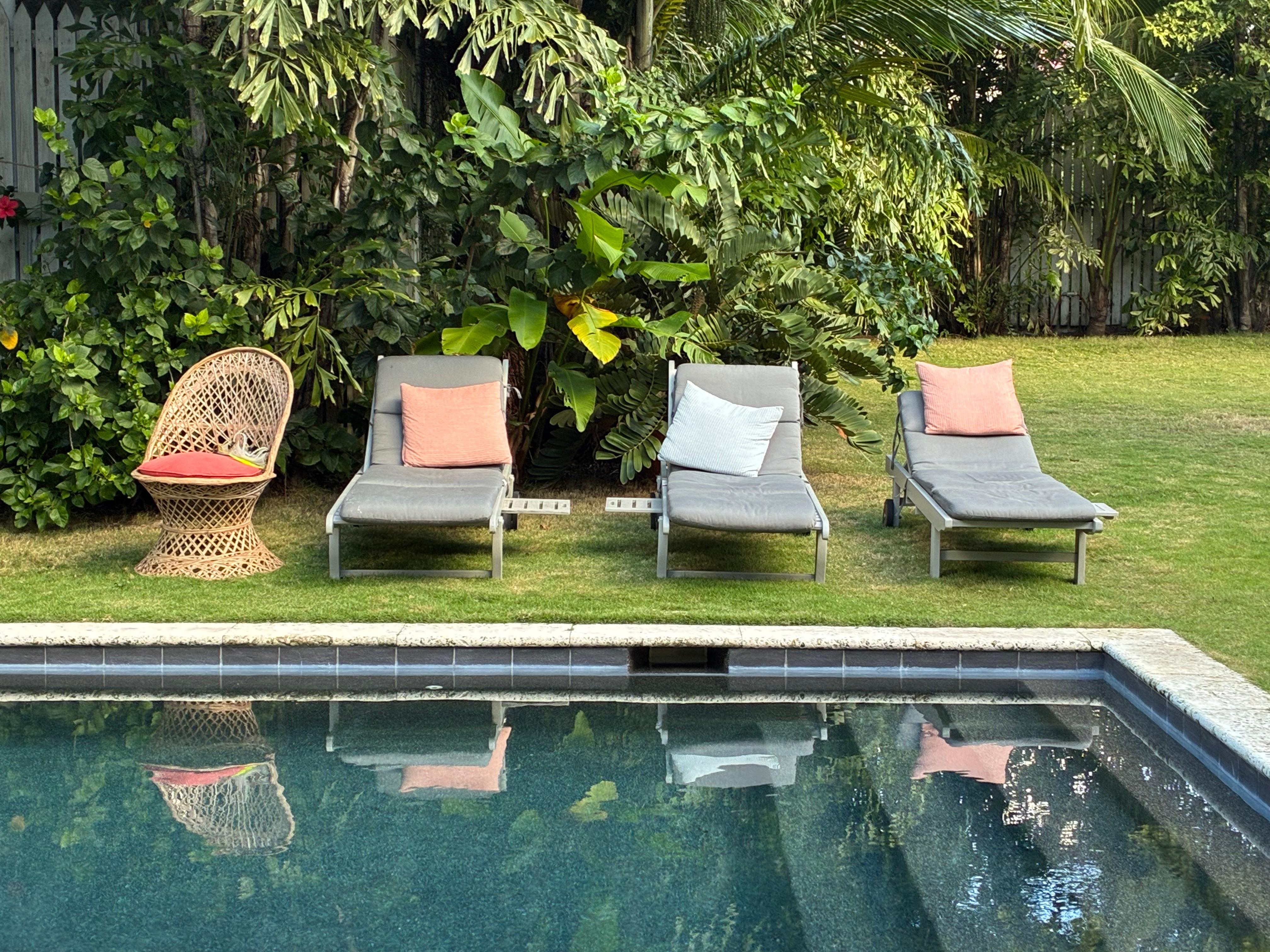 lounge chairs by the pool