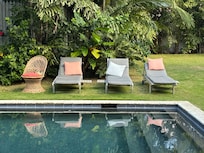 lounge chairs by the pool