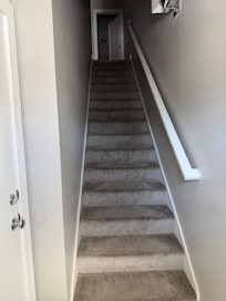 Steps from garage to second floor, living room and kitchen. 15 steps.