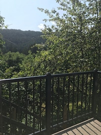 The large deck is a lovely area to enjoy  the beautiful surroundings
