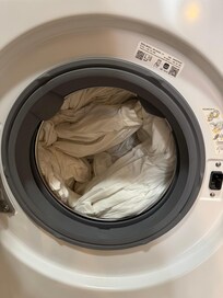 Wet sour laundry left in the washer.