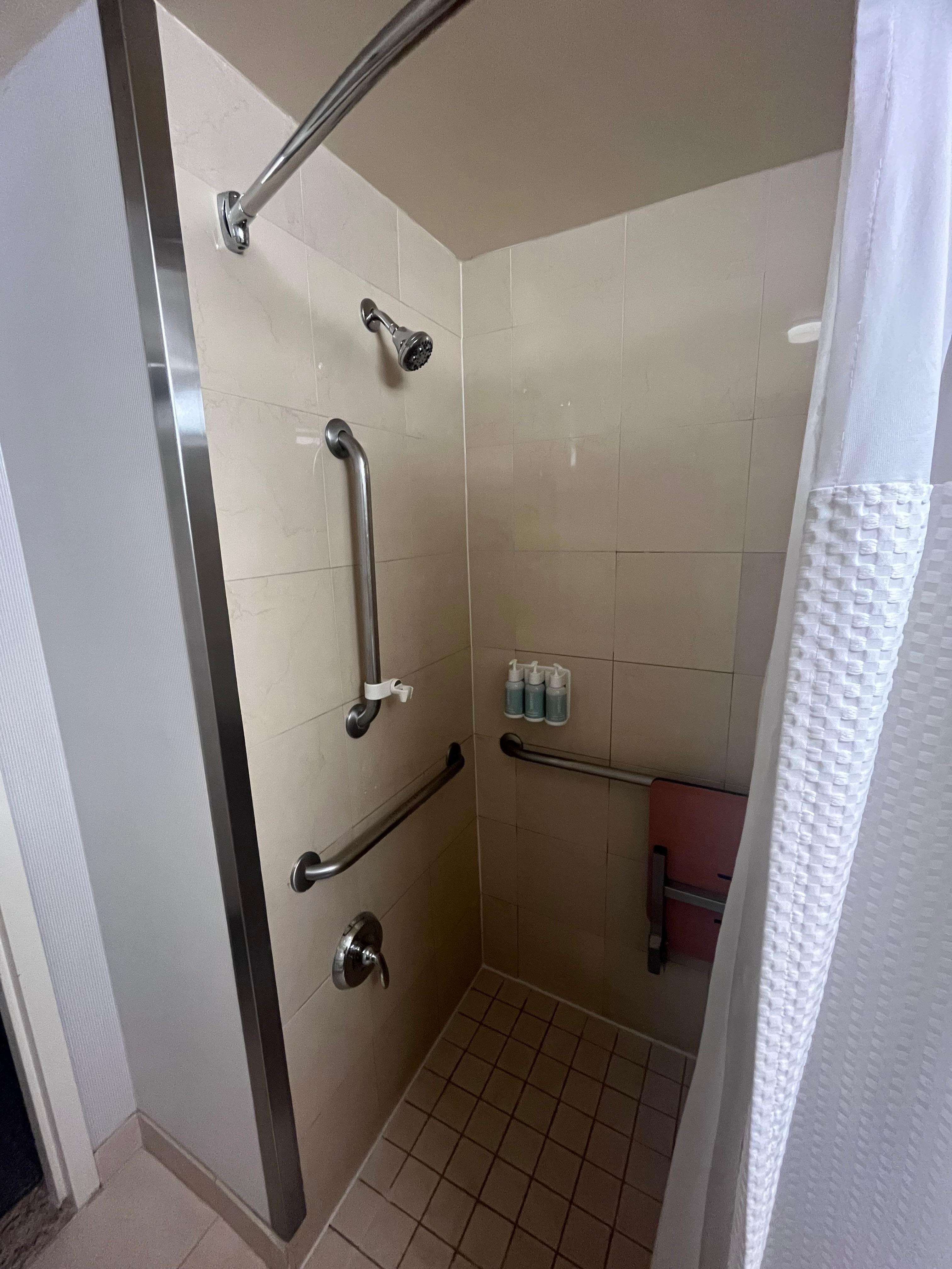 You can see they had a hand held sprayer on the bar but changed it to a normal sprayer which a wheel chair person cannot use. Very disappointed 