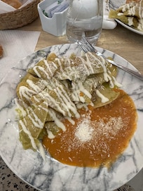 Chilaquiles and beans provided as complimentary with stay.