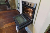 Oven door doesn't shut properly