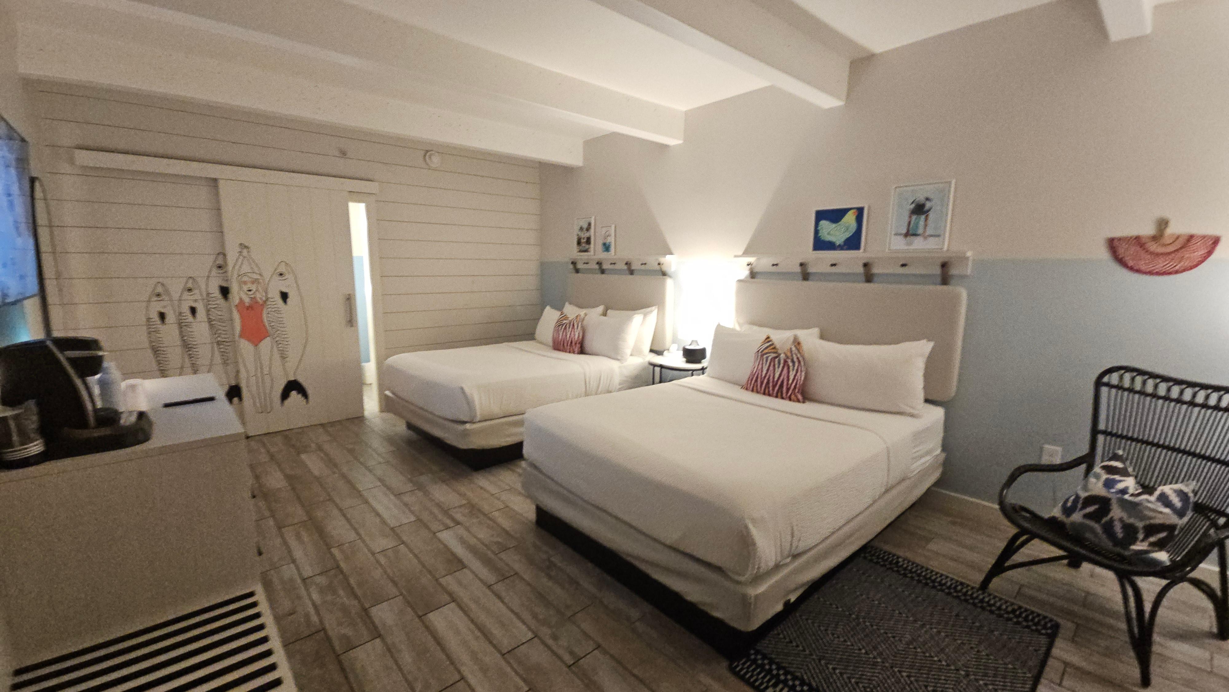 Nice room, spacious enough and with comfortable beds! 
Though bathroom door does, make some noise and yields light that disturbs the others.
Yet, light can be subdued. And very good shades on the window!