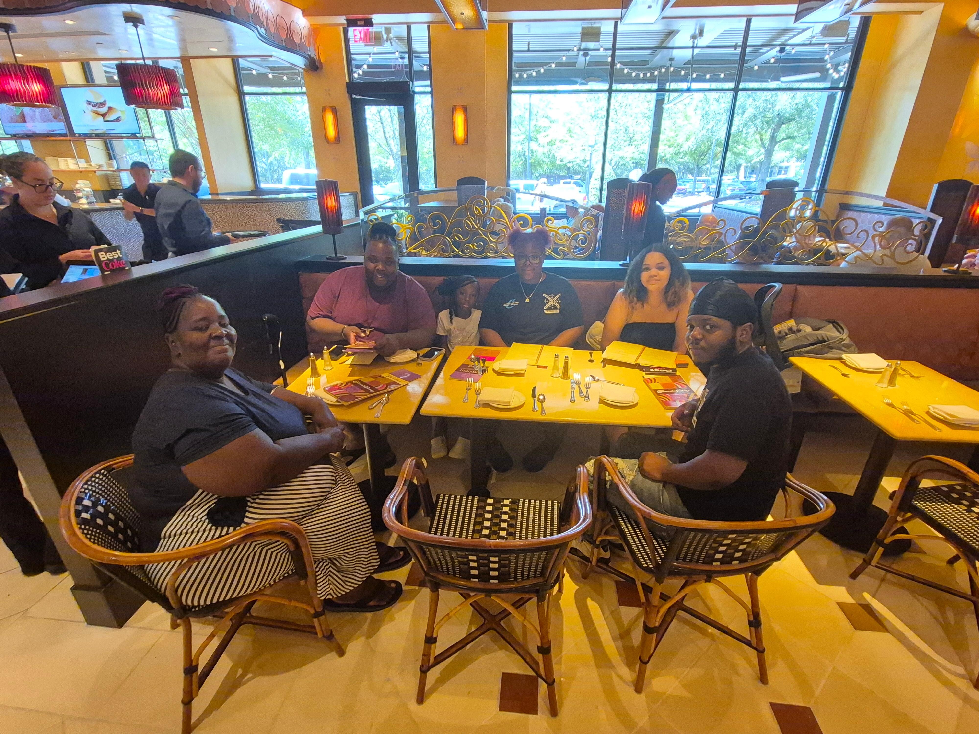 Eating out with my family, at the cheesecake Factory. 