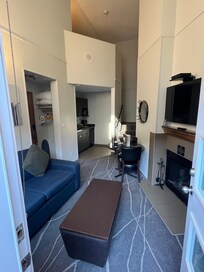 Comfortable suite with little kitchenette and log fireplace!