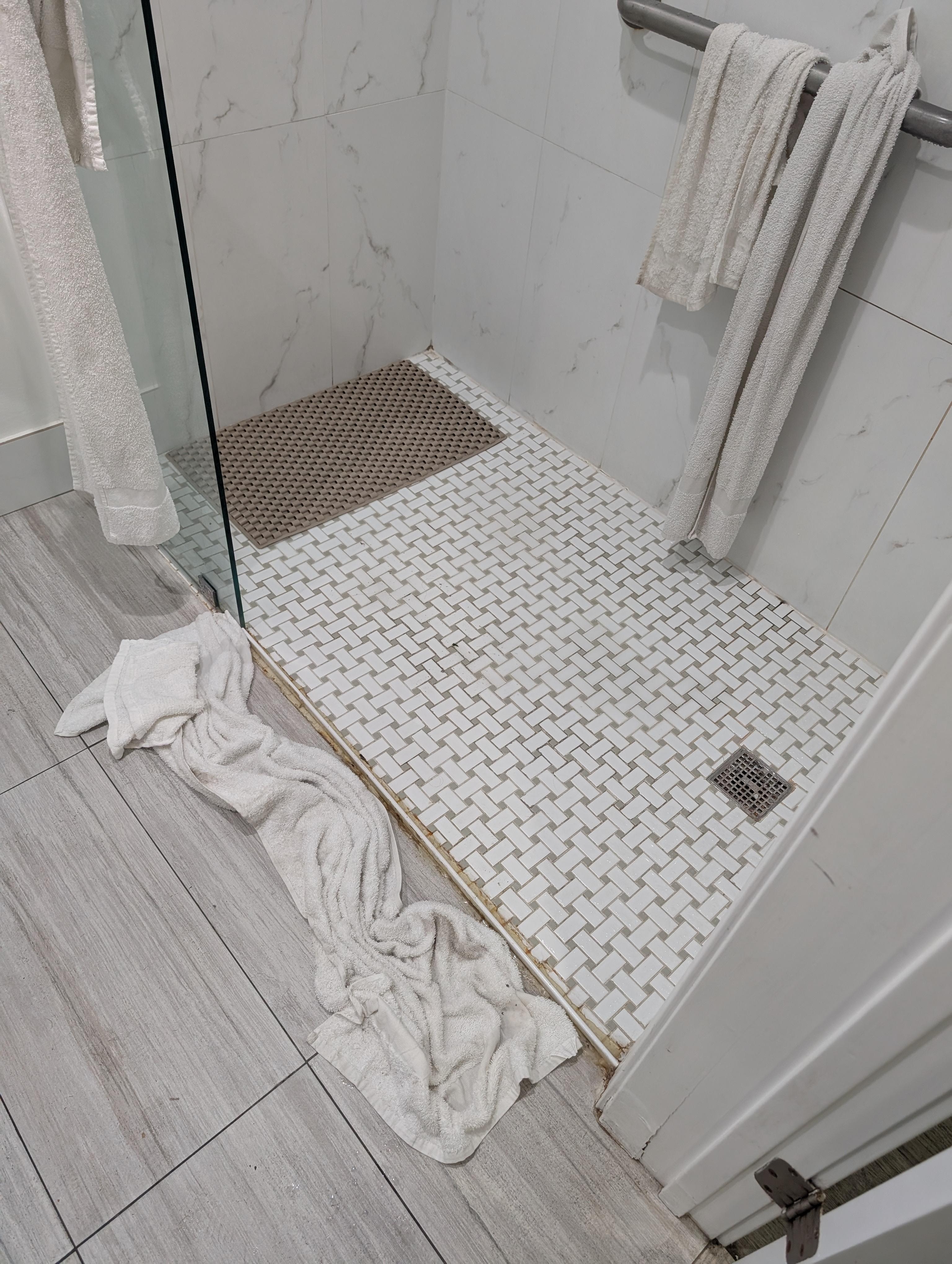 No door or curtain to prevent water from spilling out.