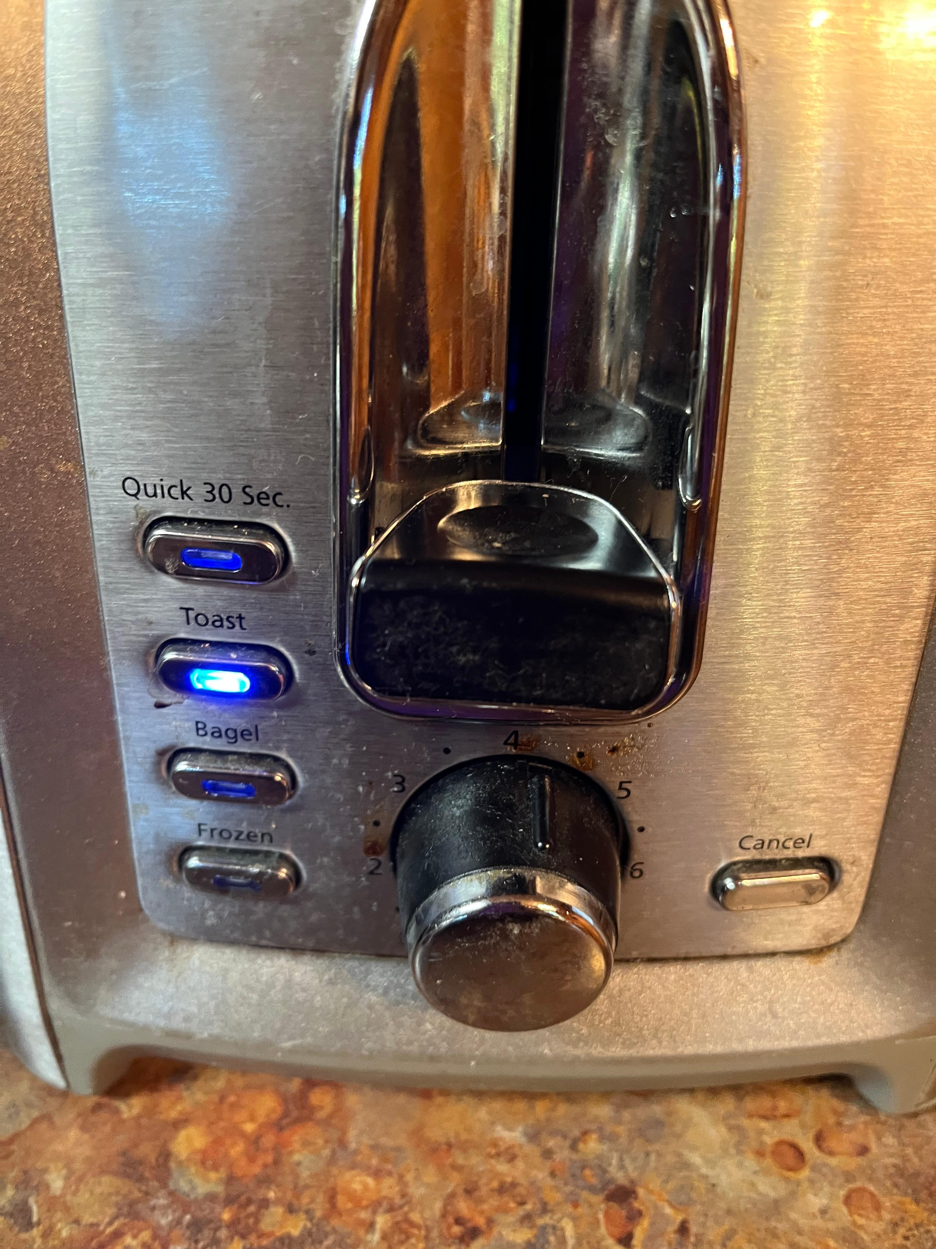 Toaster had crumbs and dirty.