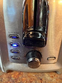 Toaster had crumbs and dirty.