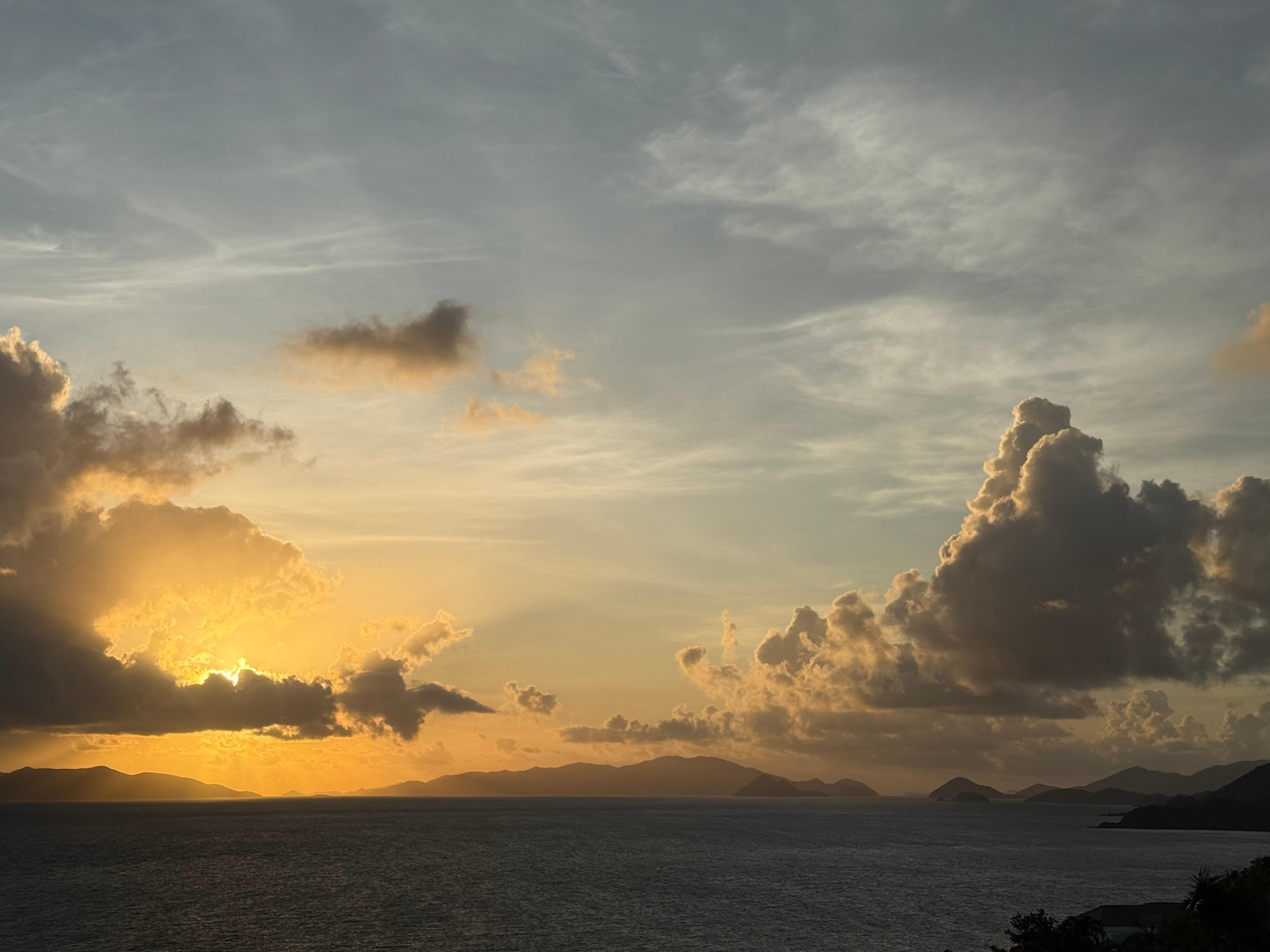 Sunrise from the seating area outside upper bedroom. 