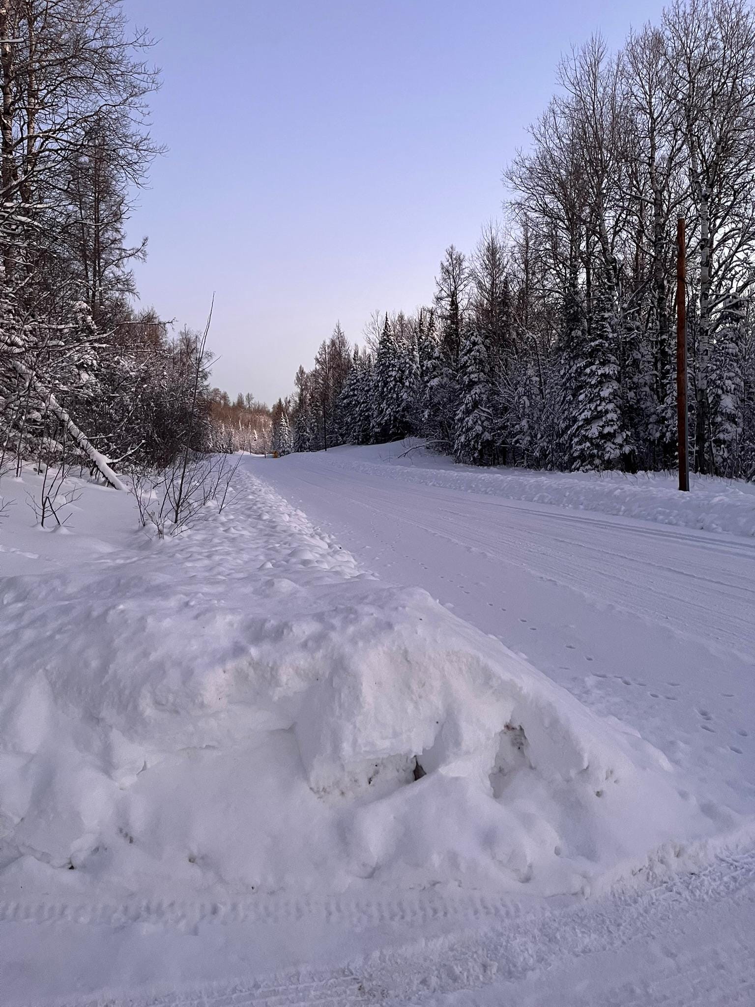 At end of South driveway entrance, looking north up County MM (Lake Drive).
