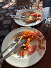 Our breakfasts inedible & left.