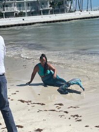 A surprise mermaid showed up on the beach