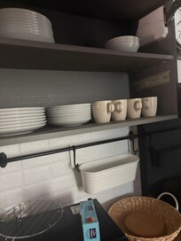 Kitchen with full set of dishes