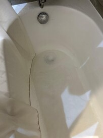 Slow draining tub in room 605